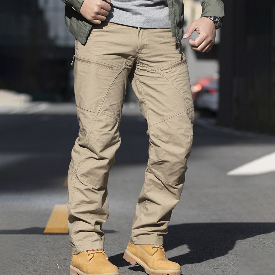 Remain dry while conquering every challenge with our Men's Urban Waterproof Ripstop Tactical Pants. These pants seamlessly combine style with exceptional waterproof protection, making them ideal for both urban exploration and outdoor adventures.
