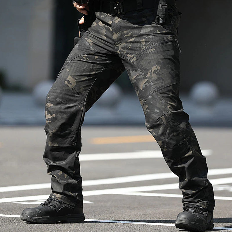 The Men's Tactical Pant is created for urban tactical men pants with law enforcement, outdoorsman, and rugged adventurers in mind. These Men's Stretch Tactical Pants Urban Pro Stretch Pants are crafted using polycotton ripstop, a premium fabric blend that provides load-bearing capabilities, durability, and comfort far beyond anything else on the market. 